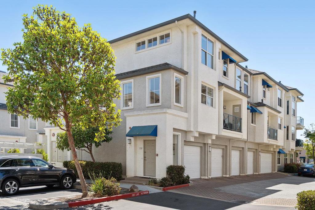 This delightful townhome offers open-living floorplan. Located just steps from the estuary, this means you will be treated to amazing waterviews, plus the coming and goings of the tides, and a variety of bird life. The complex has a sparkling pool, community center, with gym, and nearby Shannon Park, that provides a playground and picnic areas. Its like having a big backyard! This is a sought after end-unit, 2 bed, 2.5 bath townhome with high ceilings, and lots of natural light: Direct access to a 1 car garage. 2nd assigned parking space is right out the front door. Living / Dining room has a gas fireplace and a spacious balcony, convenient main-level updated Half-Bath. Kitchen: New Quartz counters, stainless steel sink, fixtures, painted cabinets and new pulls. Primary Bedroom suite has walk-in closet and updated bath with Quartz counters, painted vanity and new water fixtures EXTRAS: New Light fixtures, New carpets in stairway, hallway and 2 bedrooms: In-unit Laundry: New interior paint: Baths have new vanity quartz countertops/sinks and fixtures. HOA is $786.37/mo covers Clubhouse, pool, spa, gym, water, garbage, common area maintenance, landscaping/common area insurance. INCLUDES RSOA fee yearly membership fee.