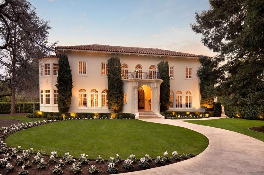 This magnificent Mediterranean Revival estate blends 1922 architectural heritage with modern luxury. Grand-scaled rooms showcase intricate moldings, European fireplaces, herringbone and parquet floors, and Palladian-style arched windows. Spanning 3 levels, the home offers a 10-seat theater, fitness center, library, and billiards room with a pub-style bar. The main residence has 6 bedroom suites including a lavish primary suite with a steam room and couture closet. There is also a wine cellar, 12-car garage perfect for a collector, plus a guest house with 2 bedrooms and an office. Impeccably maintained 1.45-acre grounds feature a pool, spa, outdoor kitchen, and heritage trees, all in a premier Atherton location. Excellent Las Lomitas schools.