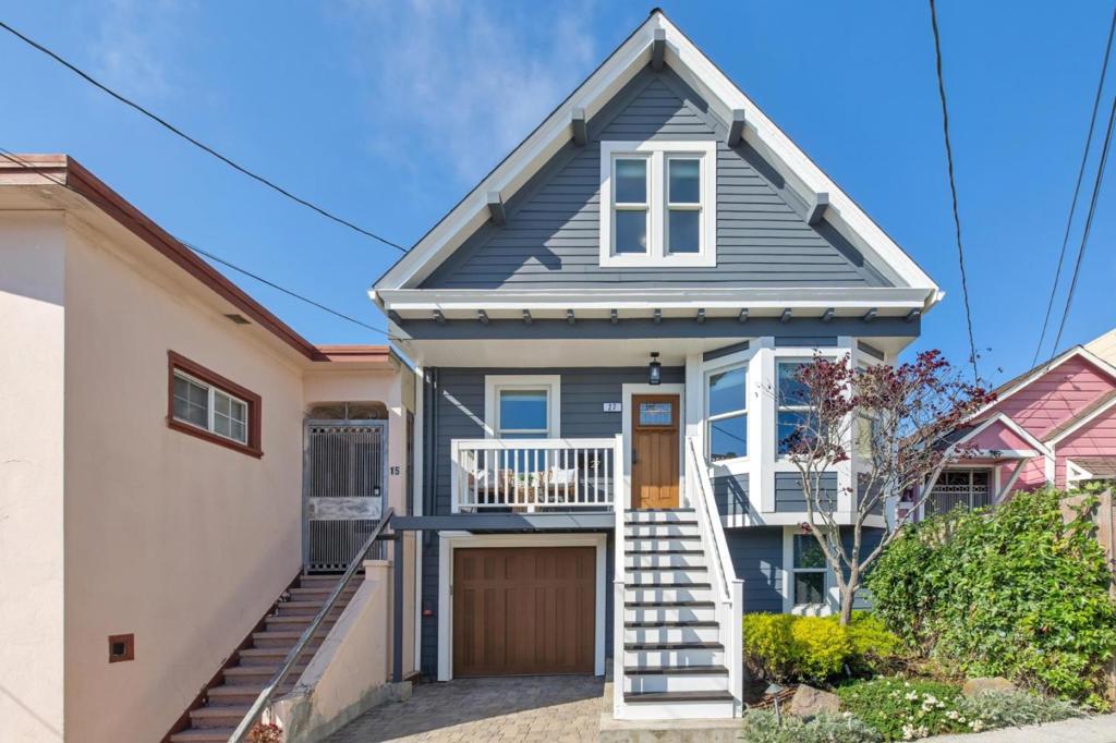 Meticulously renovated by its present owner, this 3-bedroom, 2-bath home offers a rare combination of vintage charm, thoughtful and energy conscious 21st century upgrades such as solar panels, a garden oasis, and expansion potential. Located in Original Daly City, a city known as the Gateway to the Peninsula, and mere blocks from San Francisco, this special home features a formal dining room with beautiful custom built-ins and gas fireplace, and a living room that opens to a large eat-in kitchen with modern cabinetry and quartz counters. One bedroom is conveniently situated on the main level while the other two are upstairs. Both bathrooms have been tastefully remodeled. Highlights include new exterior paint, high ceilings, crown molding, hardwood floors, Blink doorbell and cameras, Renewal by Andersen dual-pane windows, Mitsubishi mini-split A/C and heating system, on-demand water heater, 50-year cool roof, seismic upgrades, and 1-car parking in driveway plus insulated garage with EV charger and plenty of room for storage, a workshop or possibly an ADU . Peek-a-boo water views, a cozy deck off the main level, and a verdant garden with paved patio and professional landscaping offer serenity. Close to shops, restaurants, public transit, and commute arteries I-280, Hwy-1 and SR-35.