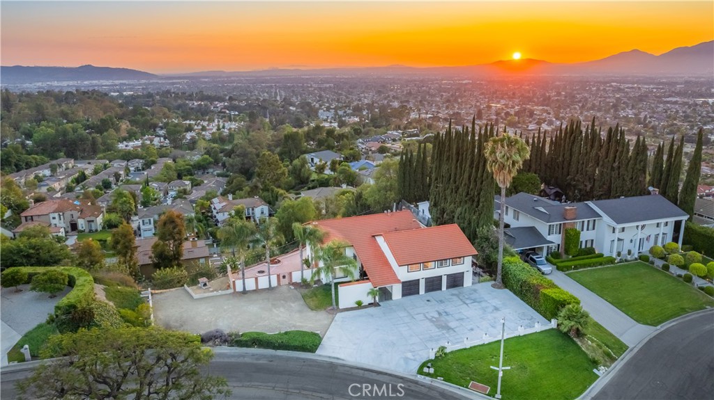 VIEW….VIEW… VIEW.... ABSOLUTELY BREATHTAKING view home with 6 bedroom 4 baths. Totally remodeled. One bedroom with bathroom on the main floor. Open and bright living room with fireplace and opens to the formal dining room. HUGE Upgraded kitchen with stainless steel appliance and LARGE counter tops perfect for entertaining family and friends. Large master suite with walking-in closet and a balcony to overlooking the city lights views. All the bedrooms on the upstairs are large size and each bedroom has views. Very private and secluded front & backyard w/ panoramic city lights, sunrise, sunsets, and mountains views. 3 car garage attached. Large ALL FLAT side-yard perfect for building an ADU. Close to golf course/ country club, shopping center, restaurants, schools, parks and easy exit to 10 freeway. Cal-Poly Pomona and MT. San Antonio College just a few minutes away. No Mello-Roos taxes & No HOA.