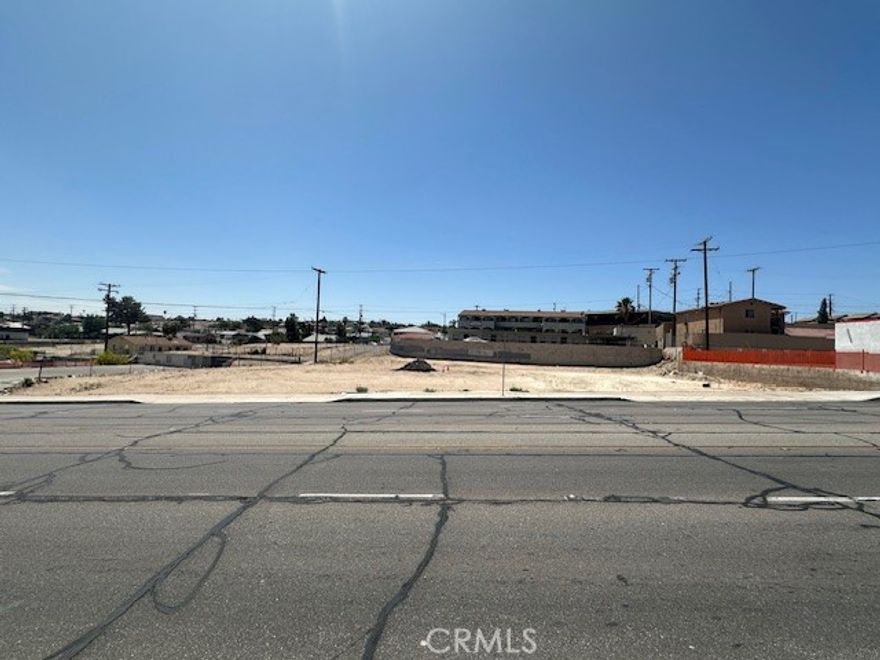 Commercial lot 18,434 sf fronting paved Main Street, Barstow. Utilities on the street (buyer to verify). APN # 0181-091-05-0000. Ideal for development. Close to other businesses, apartments, etc.