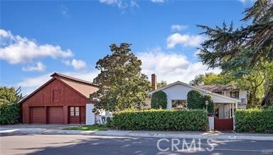 Owner has Submitted Tract Map, to City of Upland, for Review. Owner may carry paper! It will Include an Additional 7 Lots. 1890’s Home Built in the Middle of a Citrus Grove. Situated on approximately 2.3 Acres of open space. Main part of house has a Master Bedroom located downstairs, with an office or nursery and an additional 2 bedrooms upstairs with a “Jack and Jill” bathroom. Large entry highlighted with crown molding opens into a spacious living room with open beamed ceilings and cozy fireplace. Large dining Room featuring French Doors opens to a cozy courtyard. The home has the original wood flooring as well as imported Mexican Pavers. Nice Size Kitchen with plenty of cabinet space. 1 Upstairs Bedroom has a balcony with gorgeous mountain views. The other Upstairs Bedroom has fireplace and view of the back yard orchards. The main house connects to addition/ guest quarters, with separate entrance, via covered breezeway. Addition/ guest quarters, with Barn-like finishes, features nice size kitchen with large center island and opens to living room. It also includes 2 bedrooms, 2 full bath and 2 office/ playrooms. The Barn like structure also consists of 2 car garage and a workshop. Home has a very private backyard with putting green and lots of space for kids to play! The main home has a huge basement which was used for a wine cellar at one time. Home also has a shed with internet and electricity. Owner states, the onsite “Pre- Fab” 2 Bed Home, was Built for the 1932 Los Angeles Olympics.