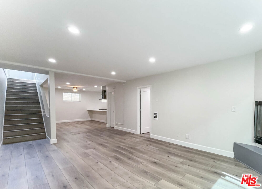 Luxuriously remodeled 1+1 in desired Montana-Wilshire neighborhood. Spacious lower unit featuring open concept kitchen to dining, living room and sliding glass door allowing plenty of natural light. Kitchen appliances include stainless steel stove, fridge, dishwasher and microwave. Full bathroom with bathtub and shower combo, recessed lighting and laminant flooring throughout. Large bedroom with convenient shelving in place, and sliding mirrored closet doors. Electric wall heaters throughout, fireplace in living room. Prime location, Walking distance to 3rd Street Promenade, cafes, shops and restaurants on Montana Avenue. Bike or walk to the beach. 1 off street parking, on site shared laundry, all utilities paid by tenant except water & trash, No pets.