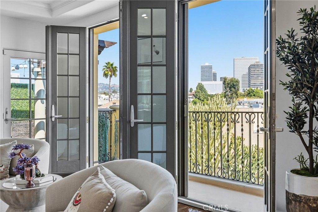 Photo of 1835 Pandora Ave #402, Los Angeles, CA 90025 (MLS # CV25231007)