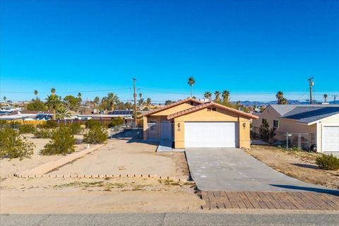 Photo of 72440 SUN VALLEY DR, 29 Palms, CA 92277 (MLS # 260010418SD)