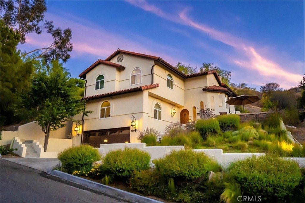 Stunning Spanish-Style Retreat in Gated Community with Hollywood Hills Vibe.
Discover your dream home in this custom-built, Spanish-style masterpiece nestled in a peaceful and safe gated community. Boasting breathtaking valley views and a prime location close to the freeway, this residence combines elegance, comfort, and low-maintenance living.
Property Highlights:
Architectural Charm: Embrace the Hollywood Hills vibe with authentic Spanish-style details, including custom tile work throughout and an excellent view of the valley for intimate evenings.
Spacious & Modern: The large primary bedroom offers a luxurious retreat, complemented by beautifully remodeled bathrooms showcasing high-end finishes.
Convenient Living: Enjoy the ease of an upstairs laundry and the benefits of included soft water service, gardener, and pest control for hassle-free maintenance.
Outdoor Oasis: A drought-tolerant yard ensures eco-friendly beauty, perfect for relaxing or entertaining while taking in the stunning valley views.
Secure & Serene: Located in a gated community, this home provides peace of mind in a tranquil neighborhood.
This one-of-a-kind home blends timeless style with modern upgrades, making it the perfect sanctuary for those seeking luxury and convenience. Schedule a showing today to experience this exceptional property! Owner will consider pets. Lease term negotiable.