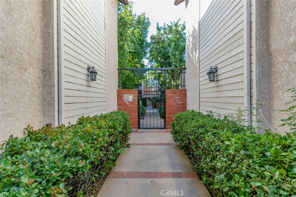 Photo of 15020 Victory Boulevard #203, Van Nuys, CA 91411 (MLS # GD25229757)
