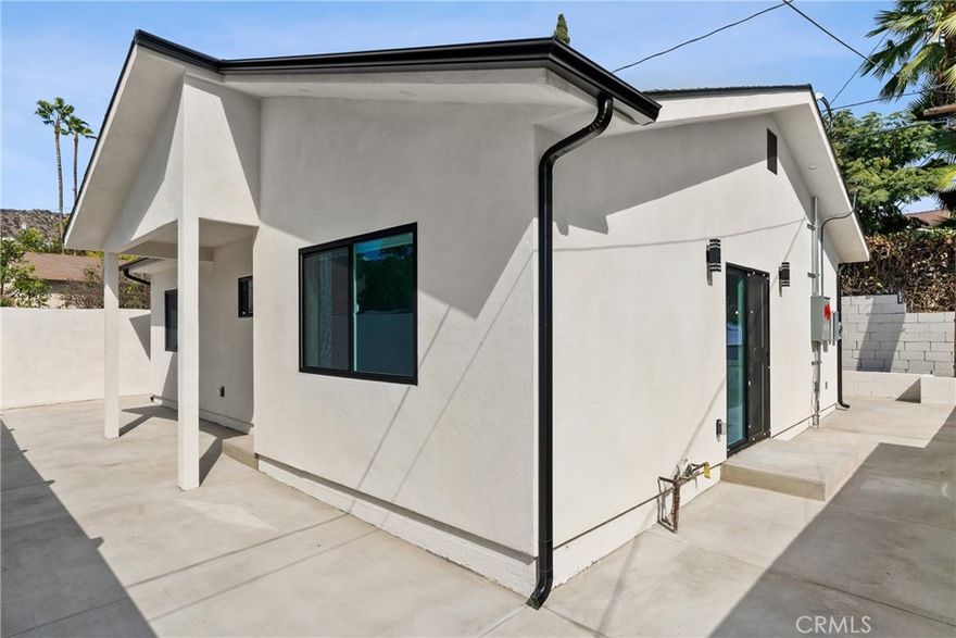 Brand-New Modern ADU in Prime Burbank Location! Welcome to your brand-new 2025-built modern home in the heart of Burbank! This stunning 2-bedroom, 2-bath ADU offers the perfect blend of contemporary design, comfort, and functionality—all on one level. Step inside and be greeted by a bright open-concept living space featuring beautiful wood flooring, recessed lighting, and large double-pane windows that fill the home with natural light. The chef’s kitchen is the centerpiece of this home, showcasing sleek stone countertops, a spacious kitchen island, and stainless-steel appliances including a gas range, oven, microwave, and dishwasher. Designed for both cooking and entertaining, the kitchen seamlessly opens to the living room—ideal for modern living. The primary suite is a serene retreat featuring a walk-in closet and an elegant ensuite bathroom with double sinks, a walk-in shower, and designer finishes. The secondary bedroom and full bath provide additional comfort, perfect for guests, a home office, or family.

This property offers central air and heating for year-round comfort, mirror closet doors, and sliding glass doors that enhance the open feel of the home. Step outside to enjoy the peaceful neighborhood surroundings with curbs, sidewalks, and street lighting, adding to the appeal of this private and safe setting. Additional highlights include new construction efficiency, modern insulation, smoke detectors for added safety, and full utility connections for cable, gas, electricity, and water. The property is located in one of the most desirable residential area's close to top-rated Burbank schools, dining, and major studios—making it ideal for professionals or small families. With its fresh modern design, high-quality finishes, and prime location, this move-in-ready Burbank ADU is the perfect place to call home!