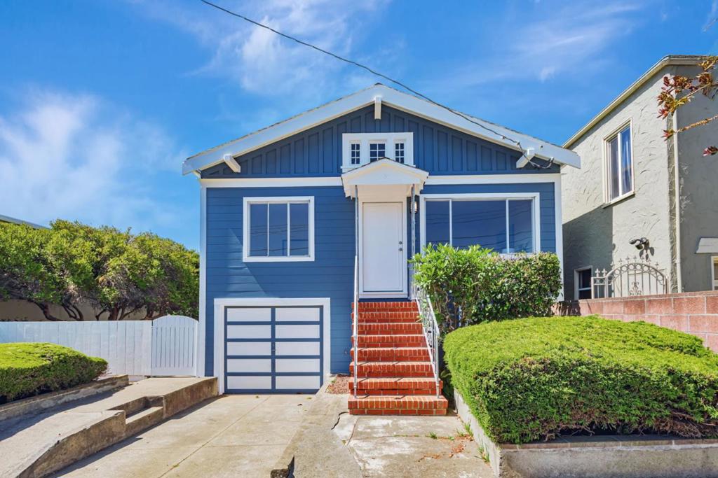 BIG PRICE REDUCTION 7/18/25 Rare opportunity in South San Francisco! Charming well-kept 3 bedroom 1 bath home offers 930 sq. ft. of living space above a full-sized open basement with a 2 car tandem garage. The space offers endless possibilities. New interior and exterior paint, updated flooring throughout, updated bath with separate tub and shower. The kitchen is ready for your personal touches. The layout has great potential to create an open an inviting space. Standout is the expansive 7,000 sq. ft. lot, offering expansion or future development opportunities. 6th Lane provides a rear entrance and unlocks development such as ADU's or more expansive units as many neighbors have done. Property also has a detached garage with electricity; perfect for a home gym, office, or just more storage. The yard is a fantastic outside space with mature fruit trees creating a serene retreat. All of this near a thriving downtown near restaurants, shopping, and major freeways. Whether you're looking for a family home or an investment with developmental upside, this property has it all.