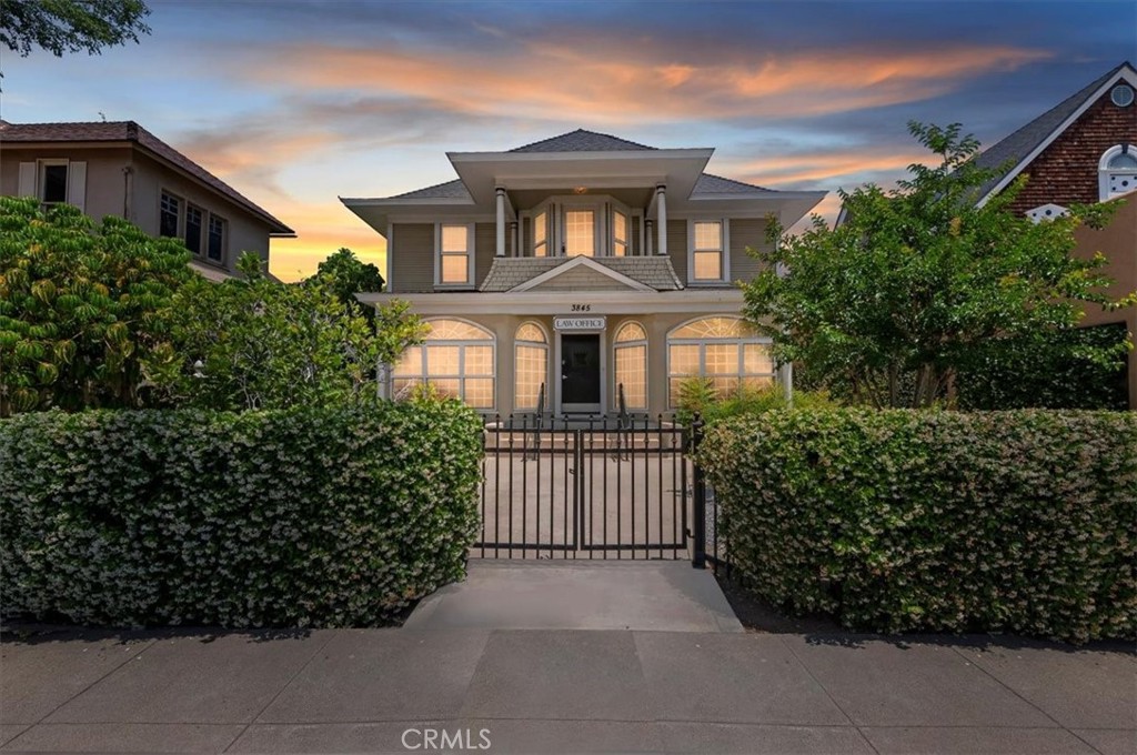 Step into an incredibly rare opportunity to own a one-of-a-kind mixed-use residential and commercial property just blocks from the iconic Mission Inn, Riverside Courthouse, White Park, and the city's best restaurants, cafes, and shops. Built in 1890 and nestled within the Raincross District Specific Plan, this historic gem blends timeless charm with modern flexibility—making it the ultimate live-work space. The property features spacious rooms and multiple office areas, offering a highly adaptable layout suited for a variety of residential and business needs. A newly installed patio cover enhances the outdoor living space, while five dedicated parking spaces and generous street parking provide added convenience for clients, guests, or personal use. Behind the private gated front yard, you’re greeted by the fragrant bloom of jasmine and a welcoming, secure entry. This is a rare offering in one of Downtown Riverside’s most walkable and culturally vibrant neighborhoods—ideal for those seeking both lifestyle and opportunity in a single location.