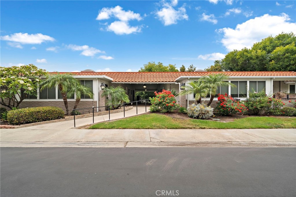 WELCOME to 3304 Via Carrizo, Unit O--YOUR DREAM HOME! This charming, END UNIT condo offers an unbeatable combination of comfort, convenience and style. Located in a highly desirable location with NO ONE ABOVE, you will enjoy a serene atmosphere and views from the left side of this unit. Best of all, there are NO STAIRS to navigate; making this home easily accessible and hassle-free! & your carport space, is located close by. Step inside to discover a beautiful UPGRADED 2- BEDROOM 2-BATHROOM, Popular Casa Vista Manor complete with an OPEN MODERN KITCHEN featuring stunning BULL-NOSED GRANITE COUNTERTOPS, RECESSED LIGHTING and designer flooring. The spacious kitchen also boasts a PULL-OUT PANTRY for extra storage. Wether you're preparing a meal or enjoying your morning coffee or tea, the seamless flow into the DINING AREA makes entertaining a breeze. The fresh CUSTOM PAINT throughout the unit and NEW DESIGNER CARPETING in the LIVING ROOM and BOTH BEDROOMS, paired with CROWN MOLDING base-boards, create an airy and inviting atmosphere throught. The DOUBLE PANE WINDOWS offer natural light and energy efficiency while IN-UNIT WASHER & DRYER add to the ultimate convenience. The PRIMARY BEDROOM is a true retreat, with ample space a CEILING FAN, pleanty of closet space plus a HUGE WALK- IN CLOSET to keep all your belongings orgized. The en-suite bathroom has been updated and features A SHOWER-TUB combination fro your relaxation, a window for natural light, and CORIAN COUNTERTOPS for a touch of luxury. The GUEST BEDROOM is equally inviting, featuring CROWN MOLDING, Base-board lots of closet space a CEILING FAN, it also offers direct access to your private BALCONY, UPDATED GUEST BATHROOM with a REMODELED WALK IN SHOWER with DUAL SHOWER-HEADS and is complete with Corian vanity countertops. The CARPORT PARKING, is JUST STEPS AWAY from the unit. This home offers the perfect balance of style, comfort and practicality. HOA dues covering; Water, Cable TV w/over 200 chanels, Trash collection, Building maintance & Building Insurance, Guard Gated, Security Patrol. Laguna Woods Village Resort-Style Living at its finest, featuring 27 Hole Golf course & a Par 3 walking course, Bocce Ball, Bridge Room, Tennis, Pickle Ball, 5 Pools, Fitness Center, Art Studio, 7 unique Club houses & more. Don't miss out on this incrediable oppurtunity to live in one of the most sought-after 55+Communities in the area. Schedule a tour today & make this beautiful condo your new home!