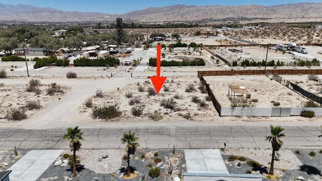 Nestled near the B Bar H Ranch community, this 10,019 square foot lot offers a rare opportunity to build in a tranquil desert setting with panoramic mountain views. The flat, buildable terrain makes it an excellent canvas for your custom home or investment property. Located just minutes from both Desert Hot Springs and Palm Springs, you'll enjoy the perfect blend of peaceful desert living with convenient access to shopping, dining, and entertainment.Wake up to endless skies, dramatic sunsets, and the raw beauty of the surrounding landscape.Please note: No soils reports, surveys, or studies have NOT been completed. Buyer and buyer's agent are responsible for verifying all details with the appropriate city or county agencies, including zoning, utilities, permits, and exact property boundaries. Buyer to rely on their own investigations.