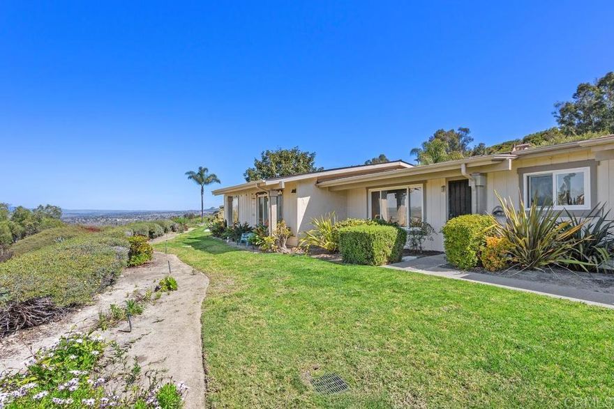 This beautifully updated single-story 2-bedroom, 2-bath home sits high above the San Luis Rey Valley, offering gorgeous panoramic views and refreshing coastal breezes. Located in the desirable 55+ Oceana Mission I community, this hilltop retreat will captivate your heart! Enjoy freshly updated finishes including new paint, new carpet, new baseboards, new fixtures, new stainless steel appliances, and new quartz countertops. A new roof was installed Fall 2024. The interior showcases warm terra cotta color tile floors, dual-pane Milgard vinyl windows and smooth ceilings. A termite clearance was completed in April 2025, giving peace of mind for years to come. The inviting layout includes a private back patio which is ideal for gardening, relaxing, or outdoor dining. The patio connects to the 1-car garage with washer and dryer included. Residents love the vibrant Oceana Mission I lifestyle, offering a clubhouse, gym, pool, spa, and beautifully maintained walking paths surrounded by lush landscaping. Water, sewer, trash, and cable TV are all included in the HOA. Conveniently located less than a mile from shopping and dining, and just minutes to Oceanside Harbor, local beaches, and easy freeway access. With its fresh updates, stunning views, and unbeatable location, this charming home is truly a must-see!