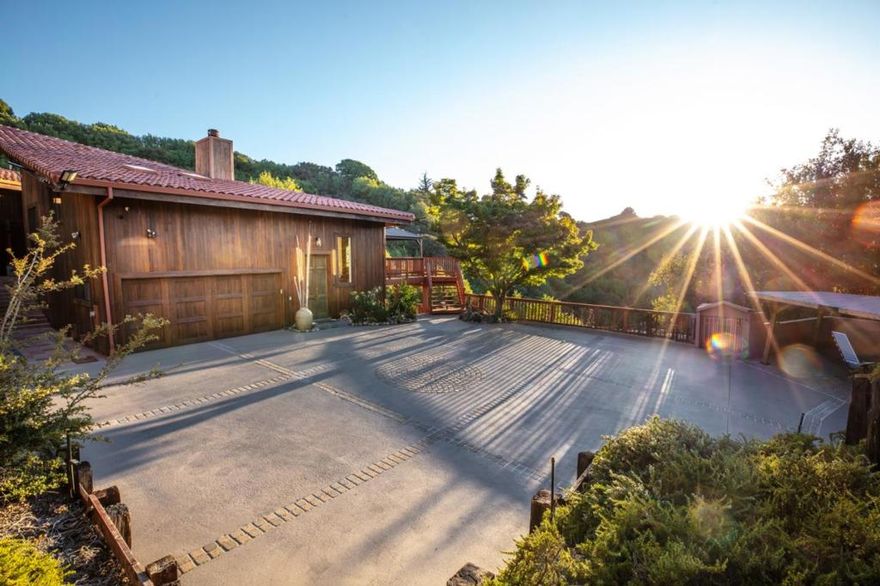 Welcome to this exquisite and expansive 7-bedroom, 7-bathroom home in the scenic hills above Cupertino that produce some of the best views in all of Silicon Valley. Known as the Peninsula's own little wine country, relax on one of your many decks while you get lost in your (west-facing) views of vineyards and the untouched natural greenbelt. You'll want to make sure you're home for the sunset. The property sits directly in the middle of 6 different wineries on 5.22 acres. With a generous 5,362 sqft of living space in the main house and another 550 sqft in the guest house, this home offers luxury and functionality for families of any size. The main kitchen is a chef's dream, featuring granite countertops, built-in oven range, gas stove, a hood over range, and a spacious pantry. Skylights throughout the property  offer natural light, enhancing the homes high and vaulted ceilings and views from almost every room. Wether you're looking for a multigenerational home or just extra space to spread out, this home can accommodate anyone's needs. Hard to imagine this kind of tranquility is just 10 mins up a very-well maintained road from the city of Cupertino and all that is happening on the Peninsula.