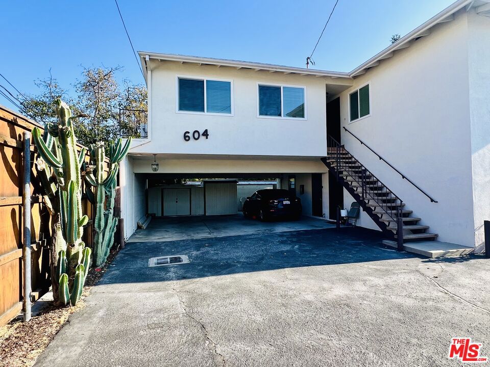Light, bright remodeled top floor one bedroom available now in a very well maintained building near Adams Square. Upper rear quiet unit has only one shared walland has lovely views of Adams Hill to the south and the San Gabriel mountains to the north. Spacious open floor plan has new distressed hardwood style floors, recessed lighting and large living area. Home has custom paint, new blinds and Washer and Dryer in unit. Kitchen has new white cabinetry, quartz countertops and all brand new stainless steel appliances including refrigerator, microwave, dishwasher and gas stove. Enjoy views from large bedroom with ceiling fan and mirrored closets. Stunning new bathroom has marble style tile, new grey vanity and is very spacious. One assignedt parking space. Available now. Pets ok!