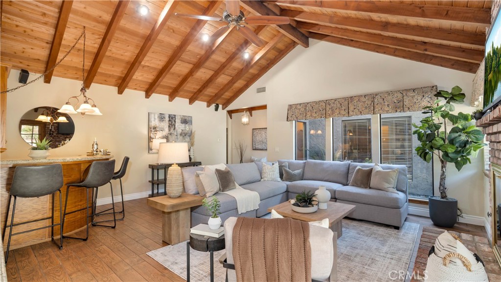 First time on the market, 20857 Fuerte Drive is a rare custom-built estate, nestled behind a private driveway in one of Walnut’s most prestigious enclaves. Surrounded by multi-million-dollar homes, direct access to bridle paths & equestrian riding arena, this timeless single-story residence offers approximately 2,325 sq. ft. of living space with 4 bedrooms and 2.5 bathrooms on an expansive 26,639 sq. ft. lot. Designed with classic cedar-lined cathedral ceilings, Italian tile floors, and carefully crafted details, this home embodies both elegance and comfort. Spacious gathering areas include a formal living room, open family room with fireplace, its own custom hardwood bar, and a bright atrium perfect for garden enthusiasts. A covered patio with spa, five-car garage, extra sheds for storage or workshop, and ample RV parking further enhance the property. The grounds are beautifully graded with mature fruit trees, offering the chance to create a true farm-to-table lifestyle. The gentle roll of the land, and expansive acreage provide endless opportunities for expansion, an ADU/JADU, or redevelopment into a custom estate.Located within the award-winning Walnut Valley School District and walking distance to Suzanne Park, the Walnut Library, and community centers, this property offers the perfect blend of privacy, location, and potential.
20857 Fuerte Drive presents a once-in-a-lifetime opportunity to own a legacy property in Walnut, offering unmatched exclusivity and incredible possibilities.