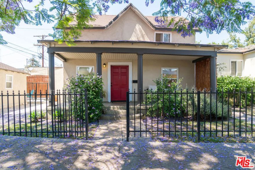 Shaded by a vibrant purple Jacaranda, this charming two-story 3BD/2BA vintage home has been thoughtfully updated with modern, eco-friendly amenities including full solar, mini splits, and an EV charger. Fully gated from the street, the property welcomes you with a spacious front porch and a comfortable layout featuring a light-filled living area, eat-in kitchen, and primary suite on the main level. Upstairs are two additional beds and a full bath. Additional highlights include a large enclosed patio, gated driveway, granite counters, tile/laminate flooring, in-home laundry, all appliances (stove, fridge, washer/dryer), and a detached garage/flex space. Conveniently located just one block from the Expo Line for easy, stress-free access to Santa Monica, Downtown, Hollywood and beyond. Tenants must have a minimum credit score of 720, a monthly income at least three times the rent, and agree to a one-year lease or longer.
