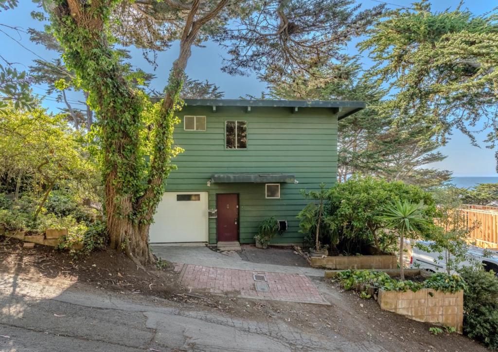 6 MONTH LEASE THEN MONTH TO MONTH- Desirable East Sharp Park Home with Ocean Views Nestled in the serene coastal community of Pacifica, this charming 2-bedroom, 1.5-bathroom home offers comfort, character, and a touch of magicafter all, how many neighborhoods can say they have a castle? 1,300 sq. ft house. on a large, woodsy lot, this residence is designed to bring the outdoors in. The living and dining rooms feature abundant windows that frame views of the trees, a spacious deck, and the sparkling ocean beyond. The flexible floor plan includes one bedroom and a full bath downstairs, while upstairs youll find the second bedroom, a half bath, the kitchen, and an open living/dining area ideal for entertaining or relaxing with a view. Additional highlights include: A generous deck for enjoying Pacificas sunsets and fresh ocean air Single-car garage parking Location in the Pacifica Elementary School District for convenient access to local schools This delightful home is a wonderful opportunity to embrace the coastal lifestylejust minutes from the beach, hiking trails, and Pacificas charming shops and restaurants.