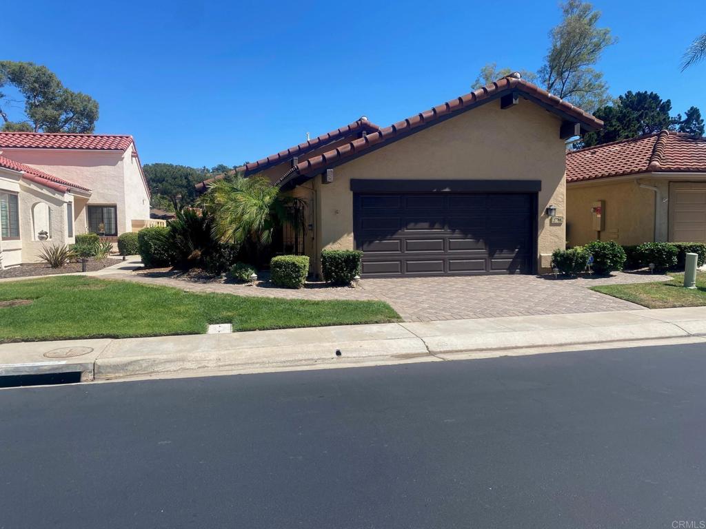 Sellers will entertain offers between $1,140,000 and $1,199,888. WOW! This 55+ Chapala beauty will sweep you off your feet! Nestled on a quiet street in the lovely, gated community of Chapala, this Oaks North home looks out onto the award winning Oaks North Golf Course. The views are simply stunning! Enjoy the very finest of indoor-outdoor living! From the moment you arrive at this amazing home, you will be impressed with its lovely touches inside and out. Arrive to beautiful pavers in the driveway that wrap around the walkways to the front and rear entries. Enter to find beautiful, hardwood floors and vaulted ceilings. Saunter outside through the sliding glass doors and enjoy incredible, picturesque golf course views, which you can enjoy from your inviting covered patio. Some of the finer features of this lovely home include granite countertops in the kitchen, stainless steel appliances, a washer dryer in the home which conveys, newer cabinetry, a stylish stain glass window at the entry, a cozy living room with inviting fireplace, a formal dining room, and plantation shutters. Additional features include a newer roof, a newer HVAC system, a newer tankless water heater, a spacious, epoxy finished 2-car garage, an owned water softener system which conveys, a Murphy bed, crown moulding, recessed lighting, a walk in tub, and a peaceful breakfast area. Enjoy the hummingbirds as they greet you each morning while you enjoy breakfast on the green! Oh, and access the fabulous Oaks North Community Center to enjoy swimming, pickleball, tennis, lawn bowling, a gym, high end locker rooms, a wood shop, social gatherings and so much more. And if you like golf, you have access to (3) nearby award winning 9-hole Oaks North golf courses...just a short golf cart ride close. Welcome Home to Chapala in Oaks North!
