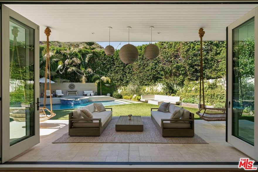 Just minutes above Sunset, this fully furnished or unfurnished 5 bedroom, 9 bathroom Brentwood estate for lease offers a rare blend of privacy, scale, and refined design. Set in one of Los Angeles's most coveted neighborhoods, the home is a true sanctuary that delivers the best of luxury indoor outdoor living.The expansive main floor showcases high coffered ceilings, two elegant fireplaces, and a seamless connection to the outdoors, creating a tranquil yet welcoming atmosphere. The gourmet chef's kitchen is fully stocked and features stainless steel appliances, a walk in pantry, and beautiful marble finishes. A sunlit main floor office offers the perfect work from home environment for Zoom meetings or quiet productivity.The primary suite is a private retreat with soaring 15 foot ceilings, dual spa like bathrooms, and dual custom closets, offering the ultimate in comfort and convenience. Upstairs, three additional ensuite bedrooms provide privacy and luxury for family or guests, while a separate first floor guest suite offers a tucked away space ideal for visitors.Entertainment is effortless. Enjoy a luxurious screening room with plush cloud couches and a popcorn machine, and a stylish game room with a full bar and a versatile billiards and ping pong setup that is perfect for gatherings. A portion of the garage has been transformed into a state of the art Pilates, yoga, and fitness studio with reformers, padded flooring, and a punching bag, making at home wellness incredibly convenient.Throughout the residence, pristine European oak floors bring warmth and sophistication to each space.Step outside into your private outdoor oasis, complete with a sparkling pool, spa, built in BBQ, fire pit, and generous areas for play, lounging, and dining al fresco.A flawless blend of luxury, comfort, and elevated amenities, this Brentwood masterpiece offers spacious living and thoughtful design that creates an exceptional sanctuary for relaxation, entertaining, and experiencing the very best of Los Angeles.