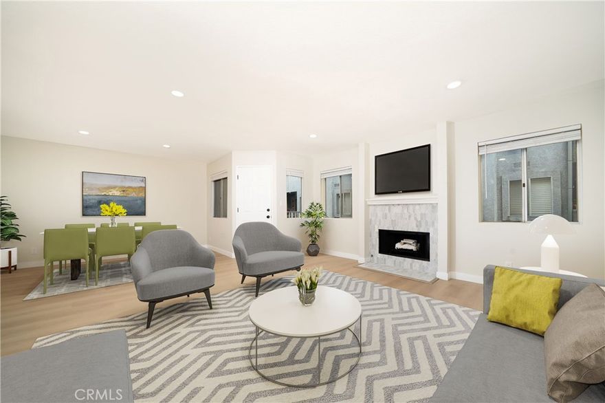 Welcome to this beautifully updated 3-bedroom, 2.5-bathroom home, located in a quiet, gated community in Harbor City. This home has been tastefully remodeled from top to bottom, offering modern finishes and thoughtful upgrades throughout. Step inside to discover brand-new vinyl flooring that flows seamlessly throughout the entire home, complemented by fresh, neutral paint. The spacious living areas are filled with natural light, creating a warm and inviting atmosphere. The kitchen is a chef’s dream, featuring brand-new cabinets, sleek quartz countertops, and new top-of-the-line stainless steel appliances. Whether you’re cooking a gourmet meal or hosting friends, this kitchen is both stylish and functional. All bathrooms have been completely remodeled with custom tile work, new vanities, and modern fixtures, offering a spa-like experience. The master suite boasts a private balcony where you can unwind and enjoy the serene surroundings. Convenience is key with a downstairs laundry room and includes brand new washer and dryer set, as well as a 2-car garage for ample parking and storage. Enjoy the benefits of low HOA dues, making this home an even greater value. And lets not forget to mention that the home has a new roof. Located in a gated community, this home combines privacy with proximity to local amenities and a short walk to the elementary school. It’s the perfect balance of comfort, style, and convenience. Don't miss the opportunity to make this move-in-ready gem your own!