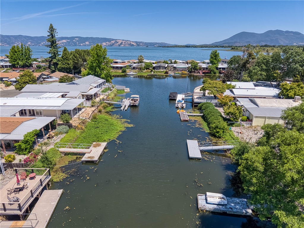 Location and Lifestyle in the most desirable lake living mobile home park - The Lagoons Mobile Home Park in Lakeport, Lake County!!!!!
Beyond the walls of this beautiful triple-wide home, the lagoon community offers a unique lifestyle tailored to those who cherish the outdoors and value peace and privacy. Perfect for morning jogs or evening strolls. Local parks, charming cafés, and boutique shops are just a short drive away, offering both convenience and a sense of community. For those who enjoy boating, fishing, or simply observing the rhythms of nature, the lagoon provides endless opportunities. Watch wild-life glide across the water, or catch a glimpse of otters playing along the lagoon. Every day offers a new chance to connect with the natural world, all from the comfort of your own home. Thank you for showing!