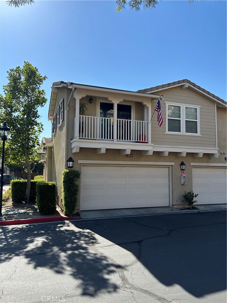 The prestigious, gated Vintner’s Grove community has been described by the builder William Lyon Homes as “comfort, convenience and carefree living”. The builder also highlighted the fact that it is “perfectly situated in the heart of Rancho Cucamonga, Canela offers a perfect combination of benefits: Home ownership along with freedom from maintenance. Situated in the desirable Vintner’s Grove community, this beautifully maintained end-unit condo blends comfort, style, and convenience. The main living area, located on a single level above the attached two-car garage, showcases an open floor plan with a spacious kitchen featuring Caesarstone counters, a large island, and ample pantry storage. The kitchen flows seamlessly to the dining and living areas, which include a fireplace and access to a private balcony. Updated flooring runs throughout, and a dedicated laundry room adds everyday convenience. Resort-style community amenities include a pool, spa, children’s playground, outdoor fireplace, barbecues, picnic areas, and park-like spaces. Ideally located near shopping, dining, and major freeways the property also benefits from a luxury apartment development being built next door—an addition expected to enhance the area’s appeal and long-term value.