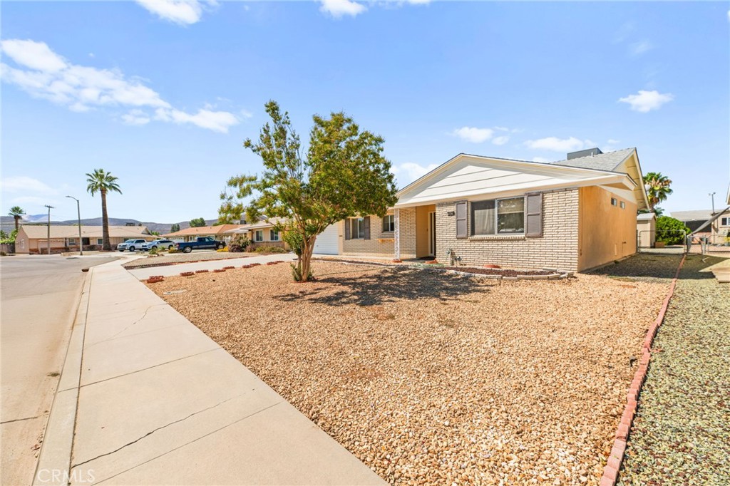 Darling 2 bedroom, 2 bathroom home in 55+ Sun City Civic Association (only $435 per year HOA!); close enough to walk to the pool, events, play pickle ball, attend clubs, etc.; close enough to walk to the grocery store, too! This home has a newer HVAC system and roof (approx. 3 years old), newer vinyl plank floors in the main living spaces and 6 month old vinyl plank floors in the bedrooms and hallway. Recently added custom pull out shelves in the kitchen, too. The home was painted inside and out less than one year ago. The large work shop near the laundry room in the rear of the garage rounds out the ideal place to call home! A newer large shed in the rear yard which can accommodate many items for storage is also included in the sale. Cute house in a darling neighborhood! Low taxes, too! Call for a tour today.