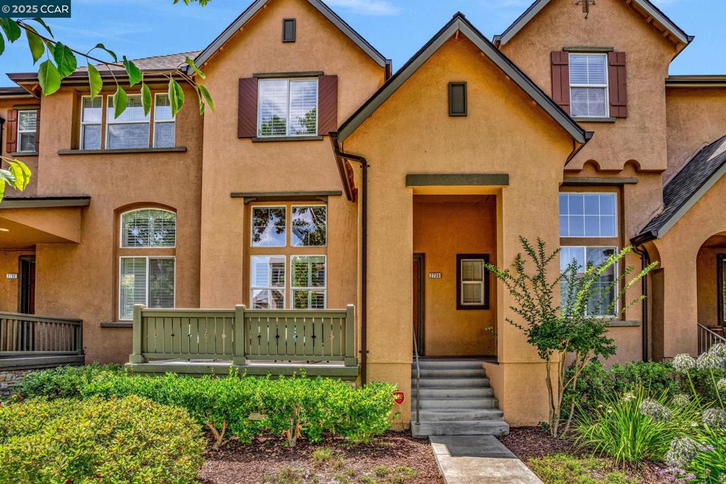 Located in the sought-after Ambridge at Windemere community, this beautifully refreshed townhome offers 2,180 square feet of light-filled living with three bedrooms and two and a half bathrooms. Fresh interior paint, brand-new carpet, and hardwood floors set a polished tone throughout. The updated kitchen and baths feature refreshed cabinetry, while the spacious primary suite includes a walk-in closet and private bath. A full laundry room with extensive cabinetry, a private balcony, and a charming front porch patio add comfort and versatility. The two-car garage provides ample storage and convenience. Enjoy access to a sparkling community pool and spa, manicured greenbelts, and top-rated San Ramon schools—all just minutes from shopping, parks, and commuter routes. Turnkey and move-in ready, this is Windemere living at its best.