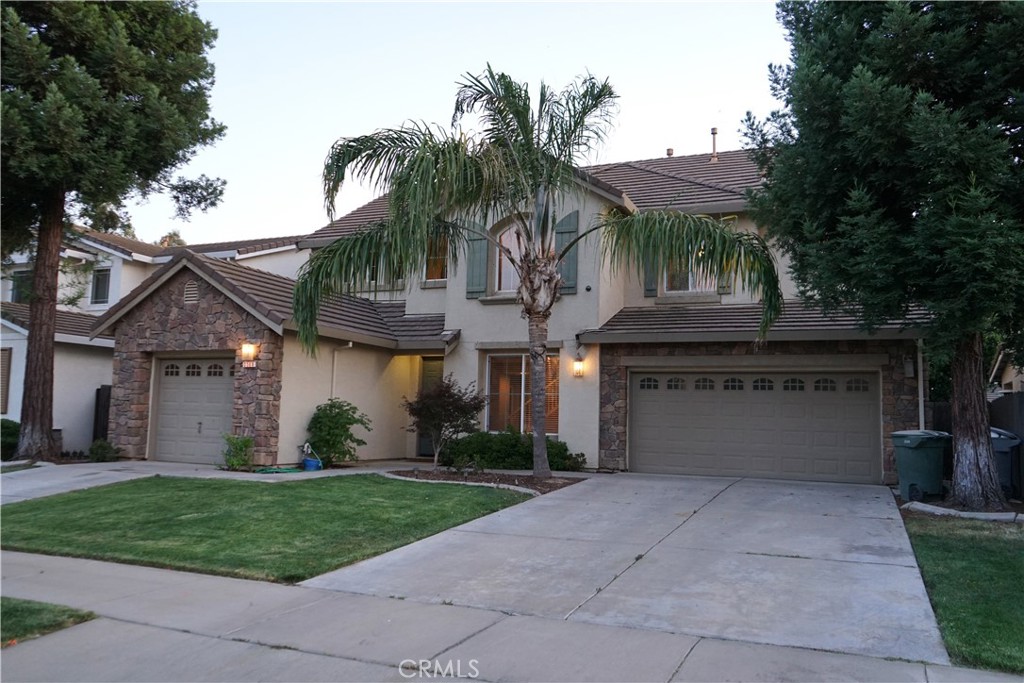 Beautiful spacious home in North Merced. This well-designed home features elegance and functional as well as open floor plan. This home has soaring high ceilings and a seamless flow through the living room and dining room. This property has 4 bedrooms and 3 full bathrooms, including a full bedroom and bathroom on the main floor- ideal for guests and family visitors. The patio is amazingly charming with shaded mature trees, perfect for relaxation.
Located in a great neighborhood close to parks, shopping restaurants and UC Merced and Merced College.
