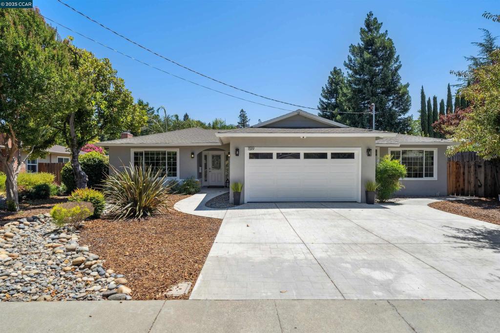 Welcome to 1519 Sunny Ct, a beautifully updated home located on a peaceful cul-de-sac in the desirable city of Walnut Creek. This light-filled residence features 4 bedrooms and 3 bathrooms, offering a versatile floor plan with both comfort and functionality. Right as you enter, you are greeted with a spacious living room with fireplace, formal dining area, and an open-concept kitchen with modern finishes, quartz countertops, and stainless steel appliances. The adjacent dining room opens directly to a the beautiful IPE deck featuring a built-in outdoor grill and fire pit, mini-bocce court, and private basketball court—creating a great setup for outdoor enjoyment and entertaining. Additional highlights include a two-car garage, dual-pane windows, EV Charger, and Tesla Powerwall. Conveniently located near top-rated schools, parks, trails, and downtown Walnut Creek’s shopping, dining, and BART.