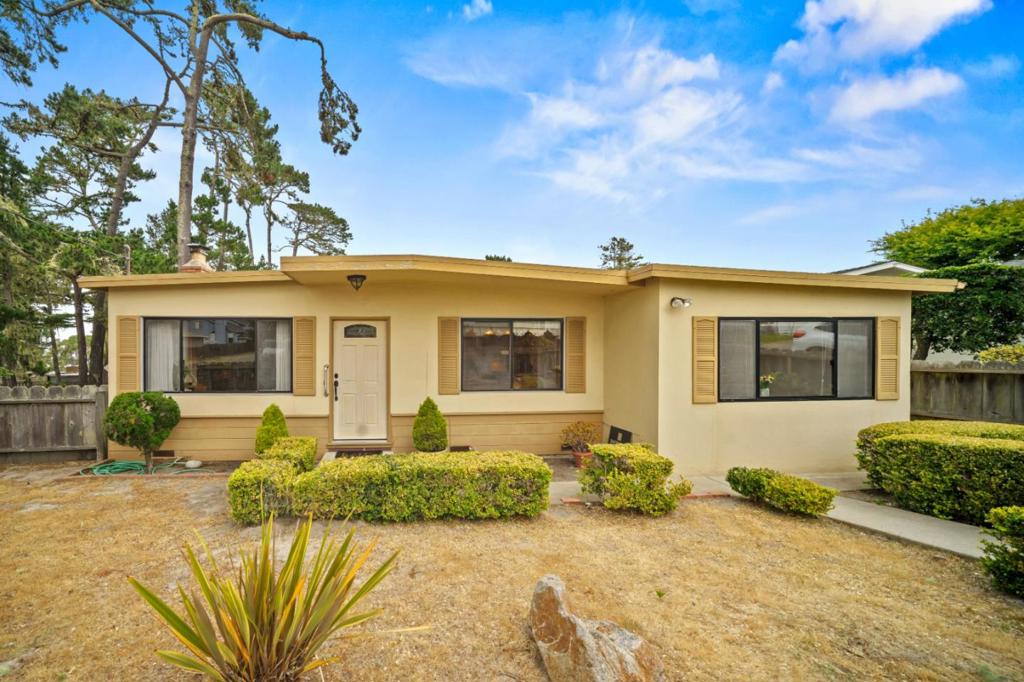 Welcome to this sweet, single-level home located in the beautiful New Monterey area on a large corner lot. This 1,340 sq ft residence features three bedrooms and two full bathrooms, providing ample space for comfort and relaxation. The kitchen has been updated with granite counters and stainless appliances (Viking range top, subzero refrigerator, miele dishwasher) with room for an eat-in dining. In addition the home boasts a formal dining room perfect for entertaining guests or enjoying family meals. You'll find hardwood flooring in the living room, kitchen, dining room and hallway (and there may be hardwood under the carpets in the bedrooms). Some updating to the bathrooms has been done. The convenience of inside laundry facilities is also a great addition to this home. The large, corner lot includes a single-car garage, plus a carport and parking for several cars inside the gate. In addition there is a covered bar-b-que area plus lots of potential for the avid gardener.. Enjoy the coastal lifestyle in a walkable neighborhood with easy access to the amenities of the Monterey Peninsula and Carmel. Don't miss the opportunity to make this Monterey gem your own!