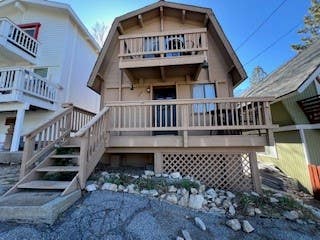 Photo of 1374 Rock Ridge Dr, Lake Arrowhead, CA 92352 (MLS # IV26182606)