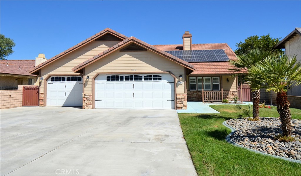 This beautiful 3 car garage home is nestled in Spring Valley Lake on the golf course. This home offers 3bd, 2ba with 1890sqft of living space. The inside has been freshly painted from top to bottom, including bathroom and kitchen cabinets. Beautiful White Shutters are throughout the home. It's a blank canvas and ready for you to add your personal touch. As you walk in the front door, you see the open and spacious Living/formal dining area with a fireplace in the center, to separate and give it a cozy feel all year long. The kitchen can be accessed from either the living or dining area and offers an open feel. Whether you are Watching your favorite shows, entertaining family and friends, preparing a delicious meal in your kitchen or just sitting at your table enjoying a cup of coffee, you will have picturesque views of the beautifully scenic golf course. As you head down the hall you will find access to the 3 car garage through the spacious in door laundry room. Continuing down the hall is the Guest Bathroom and the 3 bedrooms with the spacious primary bedroom at the end. The primary bedroom offer's the scenic view of the golf course along with access to the Back porch and a walk-in closet with built in storage. The Primary bathroom has a custom Shower, with a raised curb to easily get in and out. This house has Solar Panels and is fully landscaped. Come see this beautiful home!