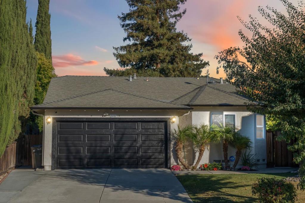 Tucked away on a peaceful cul-de-sac in the heart of Evergreen, this stunning single-story home blends space, comfort, and style. Offering 5 bedrooms and 3 full bathrooms, the thoughtful floor plan includes a separate family room, living room, and formal dining area. Vaulted ceilings in the front living room and a skylight in the kitchen fill the home with light, while a breakfast nook with floor-to-ceiling glass is the perfect spot for morning coffee or cozy meals on rainy days. The updated kitchen features new countertops, backsplash, and sink, complemented by elegant hardwood floors, recessed lighting, and custom wood cabinetry throughout. The primary suite includes a custom-built desk, while upgrades like a whole-house water softener, reverse osmosis system, and raised garden beds for organic gardening add modern convenience. Outside, enjoy a landscaped backyard oasis with apple, persimmon, and lemon trees, a vegetable garden, and a covered pergola ideal for year-round entertaining. With a two-car garage and proximity to top Evergreen schools, shopping, dining, and major highways, this home offers the perfect blend of serenity and location.