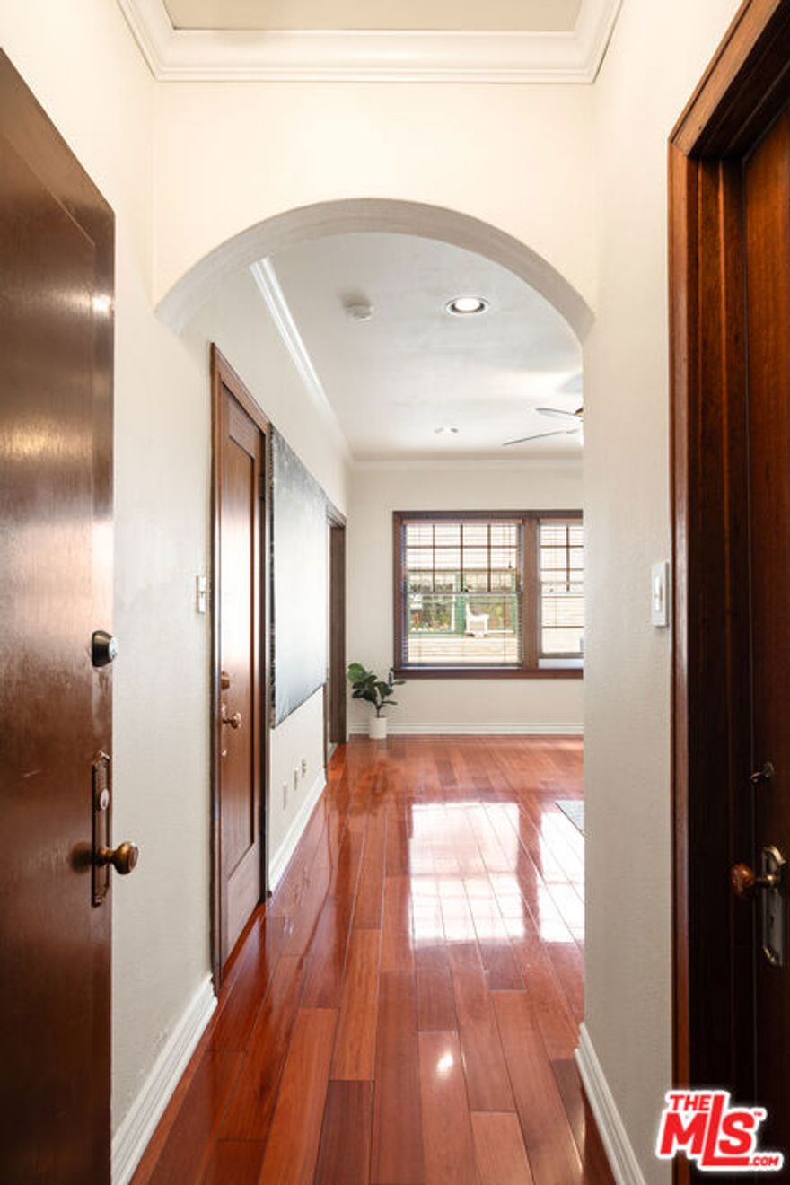 Hey there nostalgia lovers! Welcome to a piece of LA history, an architectural Landmark, the Glen Donald Building. Built in 1923, time travel to old Hollywood glamour. Located west of downtown Los Angeles and close to MacArthur Park in the Westlake district. The turn-key condo is filled with turn of-the-century charm at every corner. Upon stepping into the unit, you are greeted with architectural elements such as an arch in the entryway, redwood floors, crown moldings and mahogany wood doors. Large windows with wood frames. They just don't make 'em like this anymore. A cozy floor plan with a stylish bed alcove. No shortage of storage with 2 oversized walk-in closets with custom shelves and drawers.  Facing the interior courtyard, the condo is quiet, bright, airy and efficient. The bathroom is all charm with vintage-style fixtures, a shower and soaking tub. A well equipped kitchen with a gas stove, microwave, fridge and cabinetry. Residents enjoy access to a secured courtyard entrance. Building amenities include a luscious courtyard, grand lobby with plenty of seating and baby grand piano. Downstairs you'll find a recreational room with a lounge area and a ping pong table, a fitness room, community laundry room and bike storage.  Langers Deli is a stones throw away. Located within close proximity to USC, Loyola Law School, Downtown L.A, K-Town and the Mid-Wilshire neighborhoods. Surrounded by public transportation, the MacArthur/Westlake Metro station is only 2 blocks away. Near pharmacies, shops, supermarkets ,restaurants, fast food and public parks. The HOA fee includes electric, gas, water and trash. While there is no parking associated with the sale of this condo, there are 2 parking lots nearby. Don't miss this unique opportunity to own a piece of L.A. history.