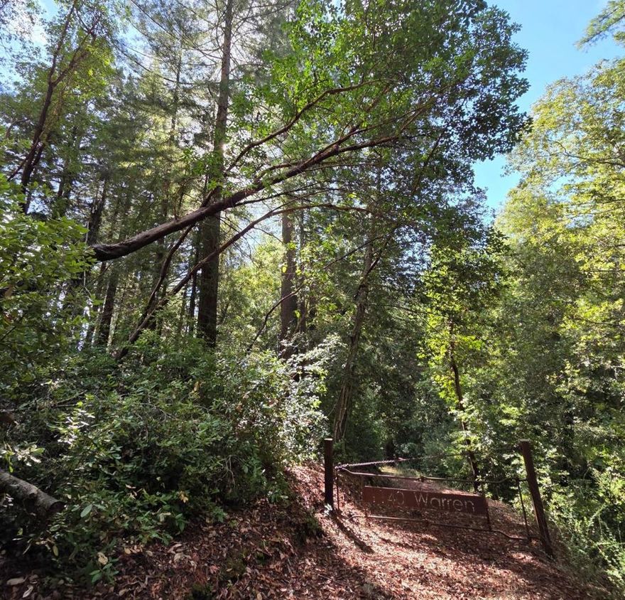 Rare 2.85-Acre Building Opportunity in Bonny Doon. An exceptional opportunity awaits you on this 2.85-acre parcel of vacant land at 1140 Warren Drive, Santa Cruz, CA 95060. Nestled in the desirable Warren Drive neighborhood of Bonny Doon, this prime building site offers a serene blend of privacy, natural beauty, and convenient access to the amenities of Santa Cruz. Lot Size: 2.85 Acres (approximately 124,320 sq. ft.) Zoning: Residential Land, Single Family (zoned for single-family residential use) Exposure: Sunny Southwestern (SW) exposure. Beautiful, Usable Land: The parcel features gently sloping, usable land with multiple building site options, including flat areas, providing flexibility for your custom home design.  Existing Infrastructure: An existing well is already on the property, providing a valuable head start for development. Easy Access: Warren Drive is a paved and private road off Smith Grade, between Empire Grad and Bonny Doon Road. A base rock driveway on the property provides easy access to the land. PG&E and Comcast cable services are available at the street, simplifying utility connections.  The location ensures a high degree of privacy and serenity, ideal for a peaceful retreat.