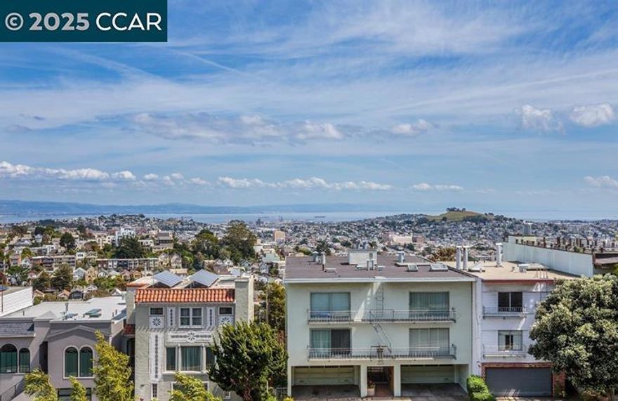 There are multiple huge views seen from various angles within the inviting floor plan. The home has an entry foyer, two nice size bedrooms, a kitchen, a large living room /dining room space and an ample bathroom. There is also a large, exclusive use, very private patio space, great for barbecuing, entertaining, and soaking in the views. There is an in-unit laundry, tons of storage space, and a warm stylistic sensibility throughout. Lots of windows create a fine, light-filled space. It's easy to see by appointment or during the scheduled showing times. Street parking only, this unit has No Garage.