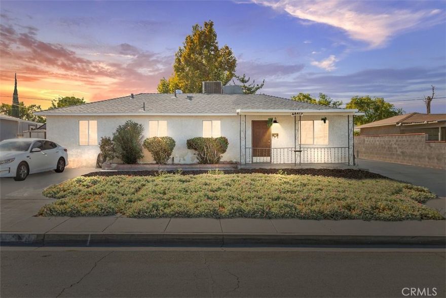 Move-In Ready Lancaster Charmer with Tons of Upgrades! Welcome home to this beautifully remodeled Lancaster gem — perfect for first-time buyers looking for style, comfort, and peace of mind! This home shows 4 bedrooms on title, but is currently set up as 3 spacious bedrooms, offering plenty of room for your lifestyle needs. Step inside and fall in love with the bright, open layout featuring a stunning modern kitchen with quartz countertops, sleek European-style soft-close cabinets, hand-glazed Spanish tile backsplash, and premium Samsung stainless-steel appliances. It’s the perfect space to cook, gather, and entertain! Both bathrooms have been completely reimagined with Spanish tile, elegant glass shower enclosures, Moen fixtures, and stylish wood vanities — giving you a spa-like experience every day. You’ll appreciate the peace of mind knowing the roof is brand new (Owens Corning 50-year, installed January 2024) and the entire home has new PEX plumbing (installed February 2025) — two major upgrades that add long-term value!

Enjoy the cozy brick fireplace in the living room, engineered wood floors throughout, and easy-to-maintain porcelain tile in the kitchen and baths. The large covered patio and spacious backyard are perfect for weekend barbecues and gatherings. Need space for hobbies or extra income potential? The detached 2-car garage includes a separate entrance, workbenches, and storage — ideal for a workshop or an easy ADU conversion. There’s even extra driveway space for RV or boat parking! With its stylish finishes, thoughtful upgrades, and move-in ready condition, this home checks every box. Don’t miss your chance to make it yours!