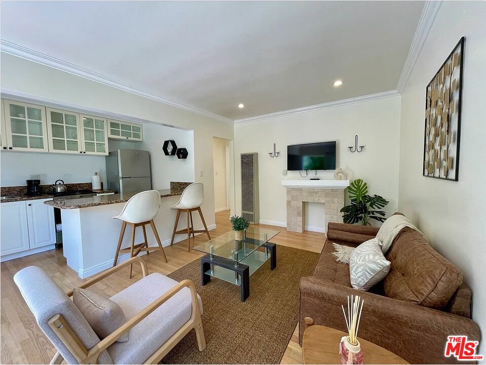 Cozy Santa Monica cottage Beautiful, newly renovated 1Bed/1Bath bungalow at 21st & California No one above or below Huge private terrace which is accessible through bedroom Recessed lighting Cute faux fireplace in living room North of Wilshire & just down the block from Whole Foods and Trader Joe's Window A/C unit located in bedroom Lots of closet space Hardwood floors throughout & stainless steel appliances Laundry in unit (located in the private back deck, exclusive to this unit) Street parking only--permit required on this block, always tons of space Water/sewer/trash included. Tenant responsible for gas & electric. Pet friendly. 1 yr lease. Please note that we do not advertise on Craigslist or Facebook.