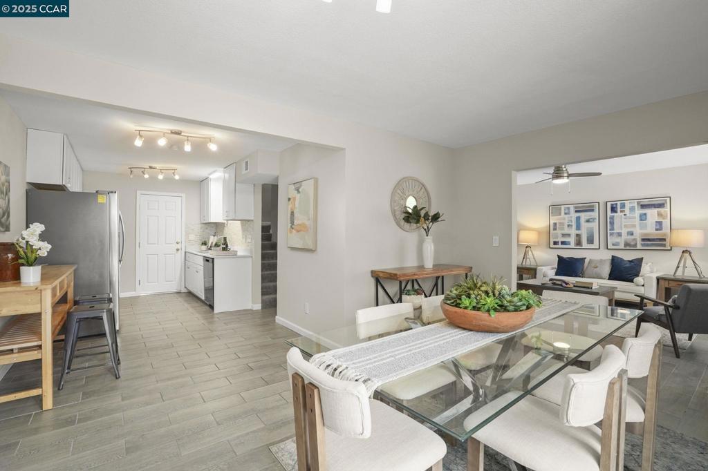 Welcome to this tastefully remodeled 4-bedroom, 2.5-bathroom duet that perfectly blends comfort and style. Located conveniently close to everything, this two-story home features updated tile flooring throughout the main living areas, fresh finishes, and an open, light-filled layout that’s perfect for both entertaining and everyday living. The modern kitchen offers ample cabinetry and flows seamlessly into the dining and living areas, creating a welcoming space for gatherings. Upstairs, you'll find four generously sized bedrooms, including a primary suite with a private bath and tons of closet space! Step outside into your private backyard, where you'll find a well-maintained garden with mature, tomato-producing plants—perfect for enjoying fresh ingredients all summer long. The yard offers plenty of space for relaxing, playing, or hosting barbecues. Additional highlights include a convenient 2-car garage, with plenty of storage. In-unit laundry, and thoughtful upgrades throughout. Move-in ready and full of charm, this home is a rare find you won’t want to miss! Open House July 19th and 20th from 1-3.