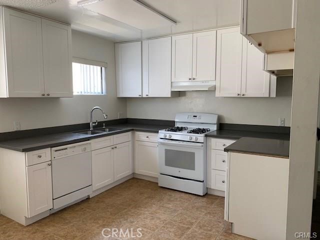 Close to "Atwater Village", "Eagle Rock", and "Echo Park". IMMACULATE 2 BEDROOM 1 BATH Upper Unit COMPLETELY REMODELED!!! Brand new copper re-pipe completed January of 2025, brand new central water heater with a recirculating pump, and fresh interior painting. Updates completed within the last few years include newer wall AC, newer tub and vanity, new/newer window blinds and closet door, dual pane windows, bright quartz kitchen with white cabinets & dishwasher, vent hood and garbage disposal, newer water proof wood laminate flooring throughout the unit, separate on-site laundry room with newer coin operated high efficiency washer and dryer, 1 designated covered carport with storage cabinets. This is a upper end unit located in a 2-story 15 unit building with center courtyard planter & mature landscaping. One of the nicest and cleanest units available. Don't miss out on this beautiful unit!