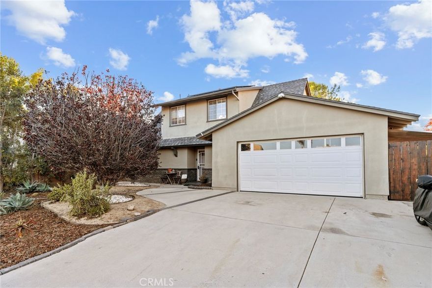 Welcome to 1369 Friant Ave in Simi Valley — a beautifully upgraded 4-bedroom, 2-bath home offering 1,844 sq ft of comfortable living and an inviting backyard retreat.

The main level features a fully remodeled 2021 kitchen, thoughtfully redesigned with a ceramic farmhouse sink and copper faucet, quartz countertops, designer stone backsplash, new cabinetry with a dedicated coffee bar, a custom vent hood, recessed lighting, an L-shaped island, and a newer LG dishwasher. The kitchen remodel also included repiping and electrical upgrades, along with new deluxe plank flooring through the entryway.

Upstairs, three of the four bedrooms received new deluxe plank flooring in 2020, replacing the original carpet. The fourth bedroom on the main level has been converted into a versatile office/guest room, and many rooms have been freshly repainted, creating a bright and cohesive feel throughout.

The backyard is designed for both relaxation and entertainment, featuring an in-ground heated pool and spa with a stone waterfall, surrounded by plant-lined fencing that provides a sense of privacy. A charming rose garden adds to the outdoor atmosphere.

This home has been lovingly maintained with care and attention to detail throughout. With thoughtful upgrades, a functional layout, and a private pool-side setting, 1369 Friant Ave is ready to welcome its next owner.