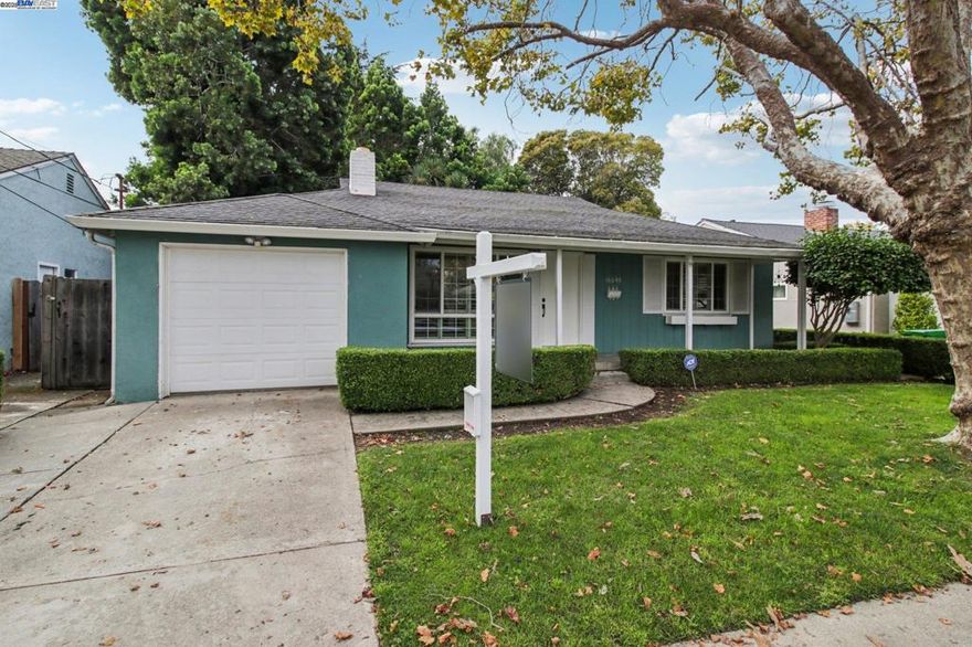 Beautifully updated home in the heart of San Lorenzo Village with a serene backyard retreat! Step inside to find a bright and inviting interior featuring fresh paint, updated flooring and a modernized kitchen and bathroom that bring a clean, refreshed feel throughout. The comfortable layout flows easily between the living and dining areas, creating the perfect setting for both everyday living and entertaining. Outdoors, the backyard offers a private space with lush landscaping that’s ideal for relaxing, gardening or hosting weekend get-togethers. Thoughtful updates, natural light and a warm atmosphere make this home truly move-in ready. Located within the Arroyo High School district and close to local shopping, dining and everyday conveniences, this home also offers easy access to I-880, I-238 and Highway 92 for commuters. Combining comfort, style and convenience, this San Lorenzo gem is one you won’t want to miss. Come check it out!