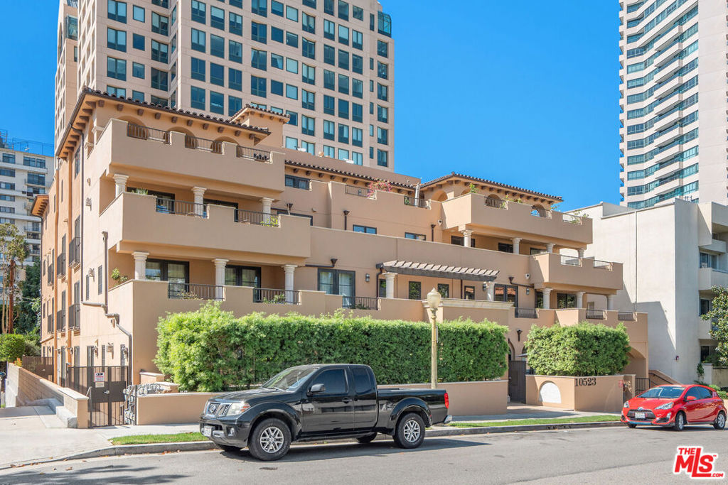 Welcome to 10523 Ashton Ave #301, a beautifully appointed 2-bedroom, 2.5-bathroom condominium located in the highly sought-after Ashton Trieste, a boutique Mediterranean-style building in the heart of Westwood. Built in 2015, this third-floor corner unit offers nearly 1,460 square feet of thoughtfully designed living space. The spacious living room features hardwood floors, recessed lighting, a gas fireplace, and nearly full-length French doors that open to a generous, hard-to-find balcony with peaceful, tree-lined viewsperfect for relaxing or entertaining. The gourmet kitchen is outfitted with stainless steel appliances, marble countertops, under-cabinet lighting, and a stylish arabesque mosaic backsplash. The primary suite includes a walk-in closet with custom built-ins and a luxurious en-suite bath with marble tiling, a soaking tub, and a separate glass-enclosed shower. The second bedroom also features an en-suite bath, and there is a beautifully finished powder room for guests. Additional highlights include an in-unit laundry closet, central HVAC, and two gated underground parking spaces. The Ashton Trieste building offers secure entry and a quiet, private feel, all while being just minutes from UCLA, Westwood Village, Century City, Beverly Hills, premier shopping, dining, and major freeways. With its refined finishes, ideal layout, and unbeatable location, this condo presents a rare opportunity to live in one of West L.A.'s most desirable neighborhoods.