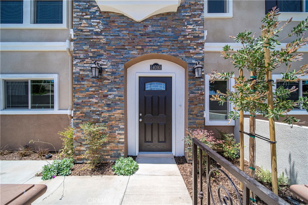 This exclusive Edwards Villa Townhome offers privacy with proximity to Westminster Mall and Huntington Beach. The upgraded 3 Bed, 2.5 bath townhouse features a stylish kitchen with white shaker cabinetry, quartz counters, and stainless appliances. The living room is perfect for entertaining, while the upstairs includes a private primary bedroom with ensuite, two additional bedrooms, and a spacious loft. Additional amenities include a laundry room, LED lighting, oversized two-car garage, and a charming front courtyard. With only twelve residences, this community is private yet conveniently close to shopping, dining, schools, and entertainment.