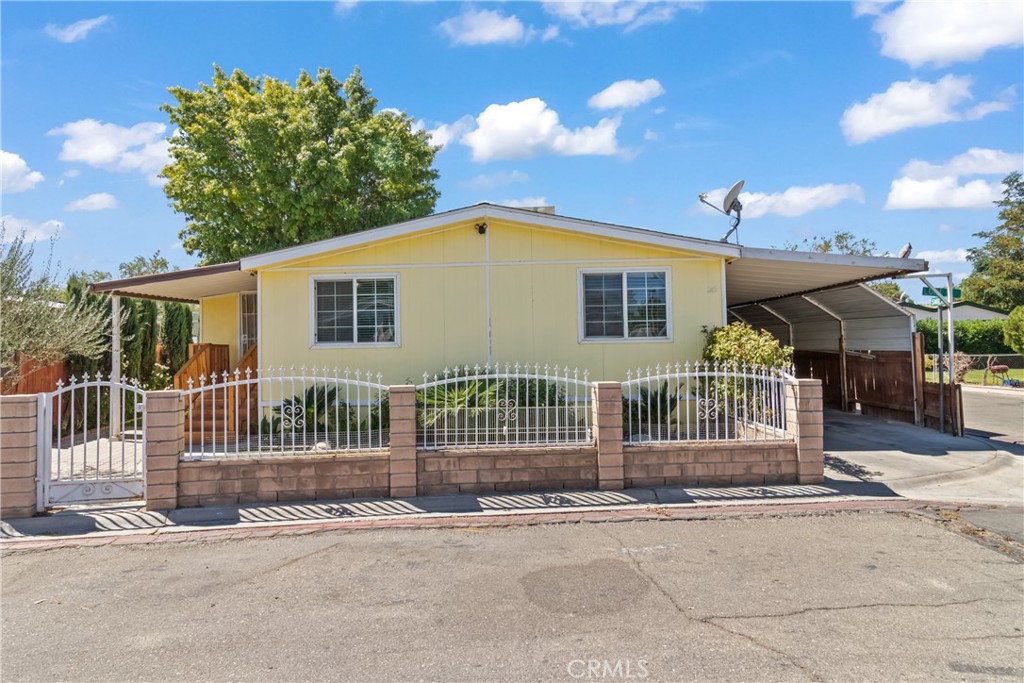 Beautifully updated 3-bedroom, 2-bath mobile home featuring a modern kitchen with granite countertops, stainless steel appliances, and plenty of cabinet space. Enjoy spacious living areas with upgraded flooring and a private fenced yard. A perfect blend of comfort and convenience, ready to move in and make it your own!