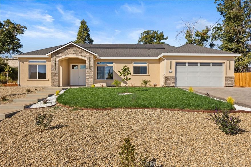 Welcome to the home in the location you've been waiting for! Tucked back on a quiet cul-de-sac of conforming homes with OWNED SOLAR, this home is sure to impress. Through the double front doors, you are greeted into the foyer which includes a coat closet to the left, and formal dining area to the right, then leads you into the open and airy living area. The living area features a vaulted ceiling, modern ceiling fan, a cozy electric fireplace with floor to ceiling stone detail, and a large slider leading to the low-maintenance backyard. The gourmet kitchen features quartz countertops with a waterfall island, LG stainless steel appliances, a gas cooktop, walk-in pantry, and farmhouse sink. This sought after split floor plan, provides a private primary suite that contains a walk-in closet, and attached bathroom that includes a dual sink vanity, soaking tub, and step-in shower. On the same end of the home is a half bathroom, and large laundry room with tons of cabinet and counter space. At the other end of the home are the 2 guest bedrooms, and guest bathroom. Additional features include a whole house fan, 2 car garage, exterior stamped concrete and so much more!