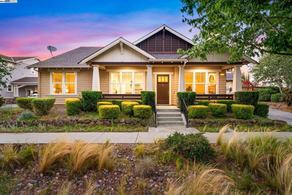 Welcome to 5477 Stockton Loop, an exceptional single-story estate nestled in Private Reserve, one of Livermore’s most serene neighborhoods. This beautifully crafted 3,434 sq ft home sits on a sprawling 10,992 sq ft lot, offering luxury and space rarely found in the area. A private gated driveway leads to a large detached 3-car garage, setting the stage for the elegance found throughout. Inside, the home impresses with soaring ceilings, detailed crown molding, and timeless hardwood plank and tile flooring that enhance both style and durability. The gourmet kitchen is a chef’s dream, featuring solid wood cabinetry, granite countertops, generous bar-height seating, stainless steel appliances, and a spacious walk-in pantry. It opens seamlessly to a grand family room adorned with ceiling beams, a cozy gas fireplace, built-in storage, and a TV nook—perfect for relaxing or entertaining. Additional spaces include a formal dining room and oversized dinette. The expansive primary suite showcases coffered ceilings, a lounge area, and a spa-like ensuite bath with travertine flooring, 8-jet Kohler tub, dual vanities, makeup vanity, walk-in shower, water closet, and large walk-in closet. A rare opportunity.