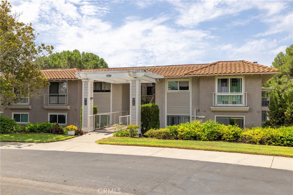 Welcome to 3168 Via Vista #C, located within the renowned guard-gated community of Laguna Woods Village, exclusively for residents 55 and over. This inviting single-level residence offers 2 bedrooms and 2 bathrooms, designed with comfort and ease in mind. The open living and dining area flows seamlessly to a private balcony overlooking peaceful, tree-lined views, perfect for morning coffee or evening relaxation. The kitchen provides generous cabinet and counter space, while the primary suite features a large closet and en-suite bath. Additional conveniences include in-unit laundry, abundant natural light, and a thoughtfully designed floor plan ideal for everyday living. As a resident of Laguna Woods Village, you’ll enjoy an unparalleled lifestyle with access to 7 clubhouses, 5 swimming pools, a 27-hole championship golf course, a 9-hole executive par-3 course (located within this gate), tennis and pickleball courts, fitness centers, an equestrian center, and more than 250 clubs, classes, and social activities. Ideally situated just minutes from Laguna Beach, world-class dining, shopping, and top-tier medical facilities. This is the perfect place to enjoy an active, vibrant, and connected retirement lifestyle.